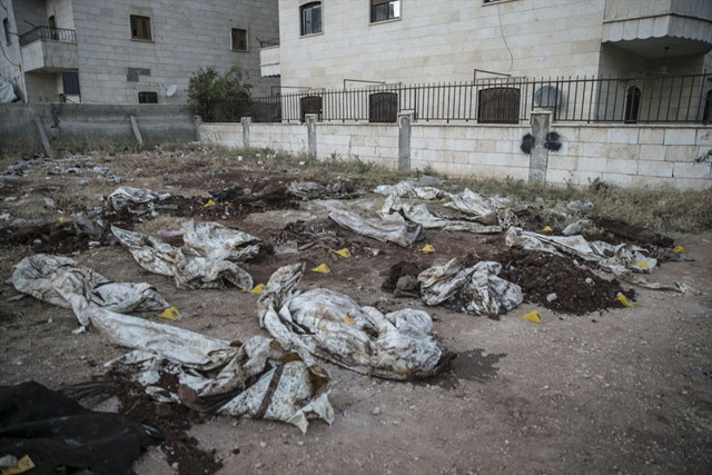 Afrin'de toplu mezardan çıkarılan ceset sayısı 61'e yükseldi - Resim: 0