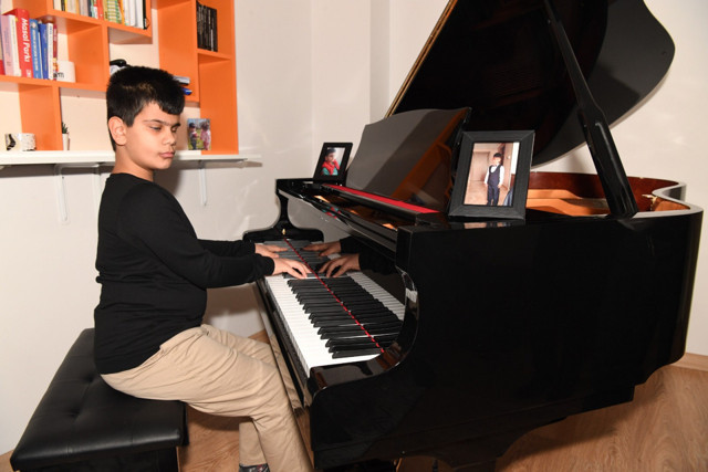 Kusursuz kulak piyanist Bager'e Cumhurbaşkanı Erdoğan sözünü tuttu - Resim: 0