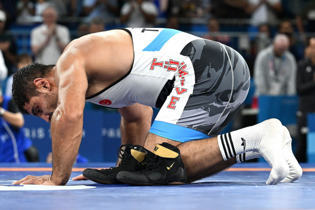 Güreşi bırakan Taha Akgül'den veda mesajı - Resim: 0