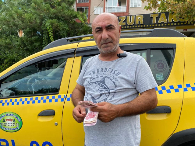 Kirasını ödeyemeyen taksiciden takdire şayan hareket: ATM haznesinde 6 bin lira buldu ben haram para yemem dedi ve... - Resim: 0