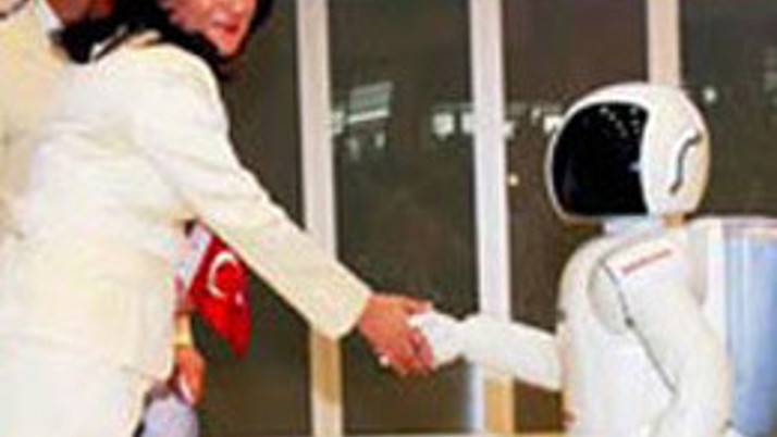 Objektiflere robot Asimo'yla poz verdi