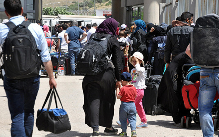 Bu uygulama ilk kez yapıldı: Bayram için ülkelerine gidiyorlar!