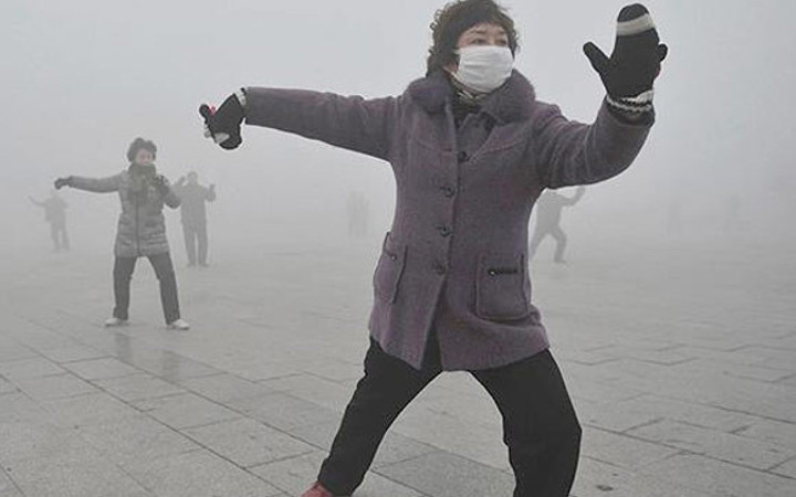 Çinliler maskesiz sokağa çıkmıyor