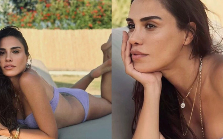 Oyuncu Şükran Ovalı plaja pembe pijama ile inince...