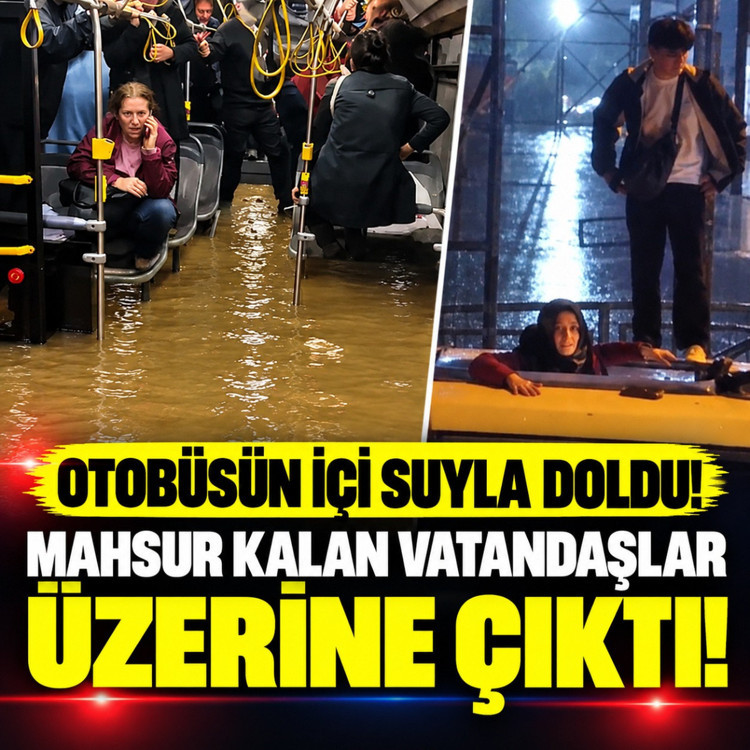 Sel sularında mahsur kalan yolcular otobüsün çatısına çıktı