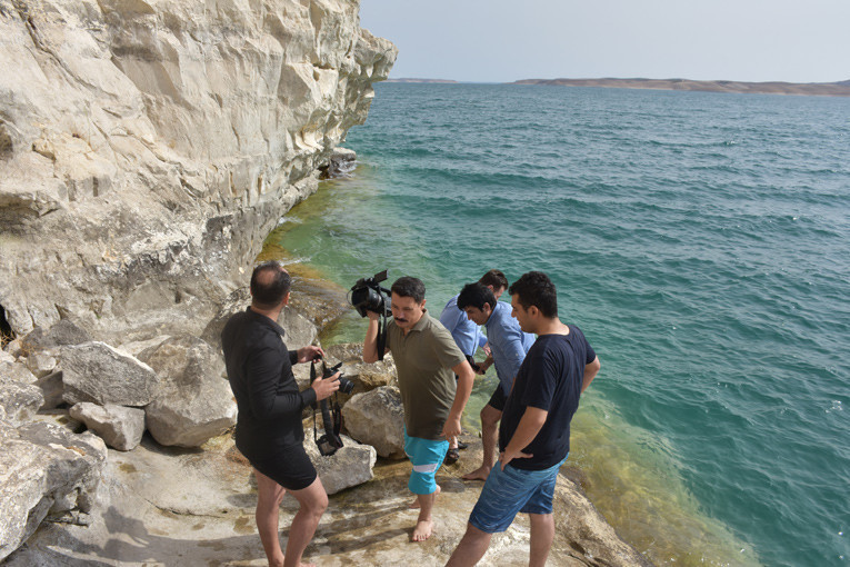 Tesadüfen bulundu! Kıyafetleriyle suya atladılar - Resim: 4