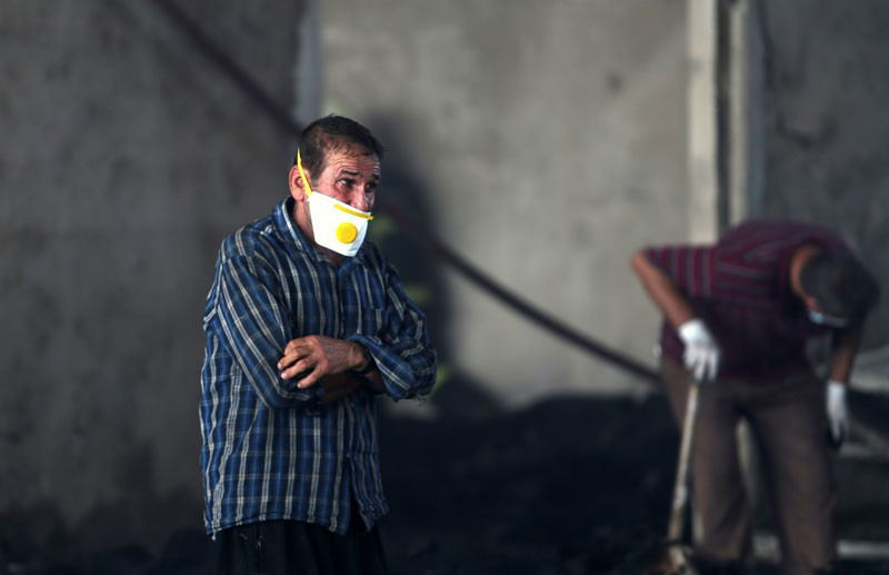 Küllerin arasında patronlarını arıyorlar - Resim: 3