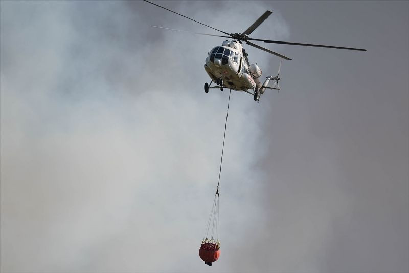 İzmir'in Gaziemir ve Buca ilçeleri arasında çıkan orman yangınına müdahale sürüyor. - Resim: 4