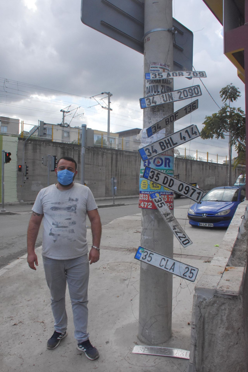 Dilek ağacı gibi elektrik direği İzmir'de sahipli plakaları böyle astılar - Resim: 2