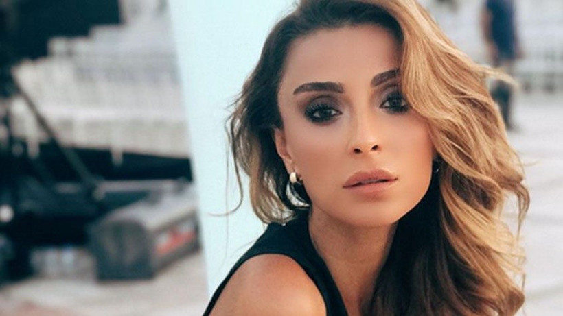 Özge Ulusoy frikiğine bakın umursamadı bile - Resim: 1