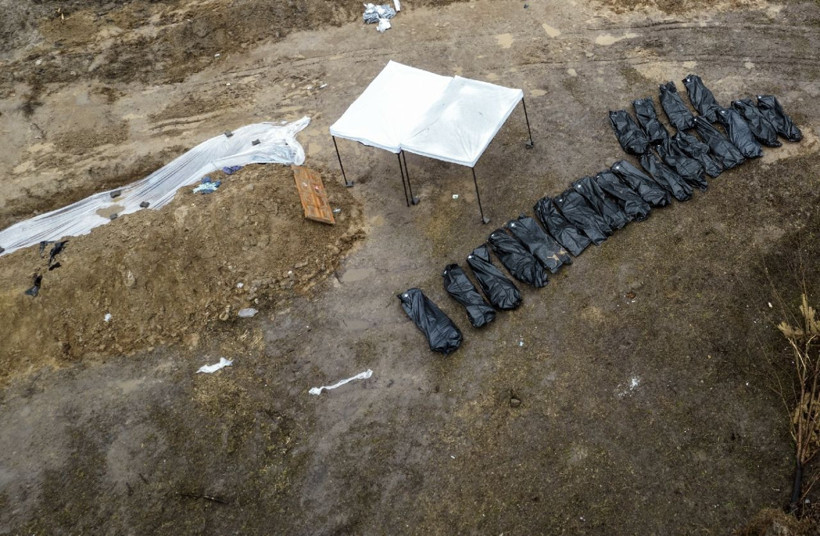 Ukrayna Buça'da toplu mezardaki cansız bedenler çıkartıldı - Resim: 4