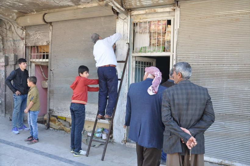 Cizreli kadın Kur'an-ı başının üstünde taşıdı! - Resim: 4