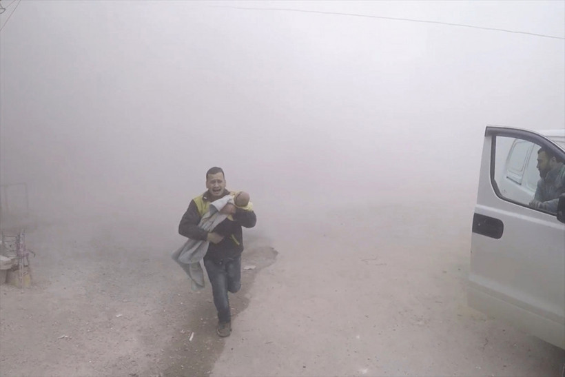 Esed vahşetinin resmi! Tek bebeği vurulunca... - Resim: 1