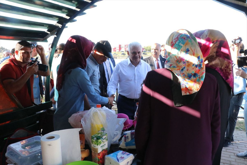 Çatık kaşlı portresini gören Binali Yıldırım espriyi patlattı! - Resim: 4