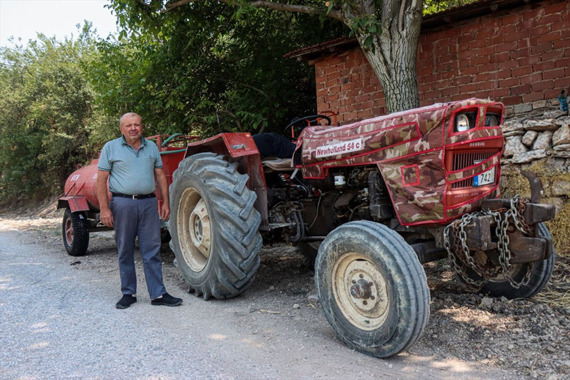 Sağduyulu vatandaş orman yangınına su yetiştirmek için patlak lastikle yol katetti... - Resim: 2