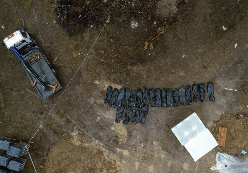 Ukrayna Buça'da toplu mezardaki cansız bedenler çıkartıldı - Resim: 2